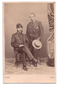 SEATED VIEW OF A UNION SOLDIER OF THE 11TH REGIMENT & CIVILIAN FRIEND WITH STRAW HAT