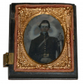NINTH-PLATE TINYPE OF A SEATED FEDERAL SOLDIER IN A HALF UNION CASE 