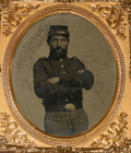 SIXTH-PLATE TINTYPE OF A TOUGH LOOKING FEDERAL INFANTRYMAN