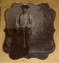 SIXTH-PLATE TIN OF A YOUNG MAN HOLDING A SMITH CARBINE