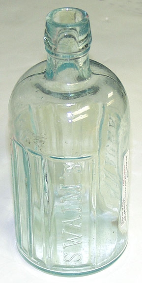 MEDICINE BOTTLE, CIRCA 1860-1870