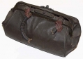 LATE 19TH CENTURY MEDICAL BAG W/23 SMALL TIN BLEEDING CUPS