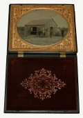 HALF-PLATE TINTYPE OF FARRIER SCENE IN GUTTA PERCHA CASE