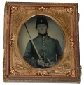 SIXTH PLATE TINTYPE OF AN ARMED UNION ARTILLERYMAN