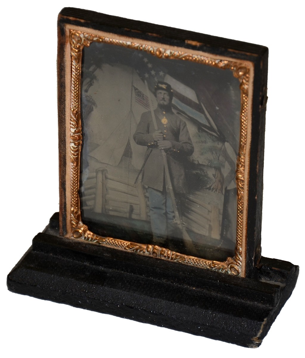 TINTYPE OF RIFLE ARMED UNION SOLDIER WITH BOTH A PAINTED AND A REAL FLAG