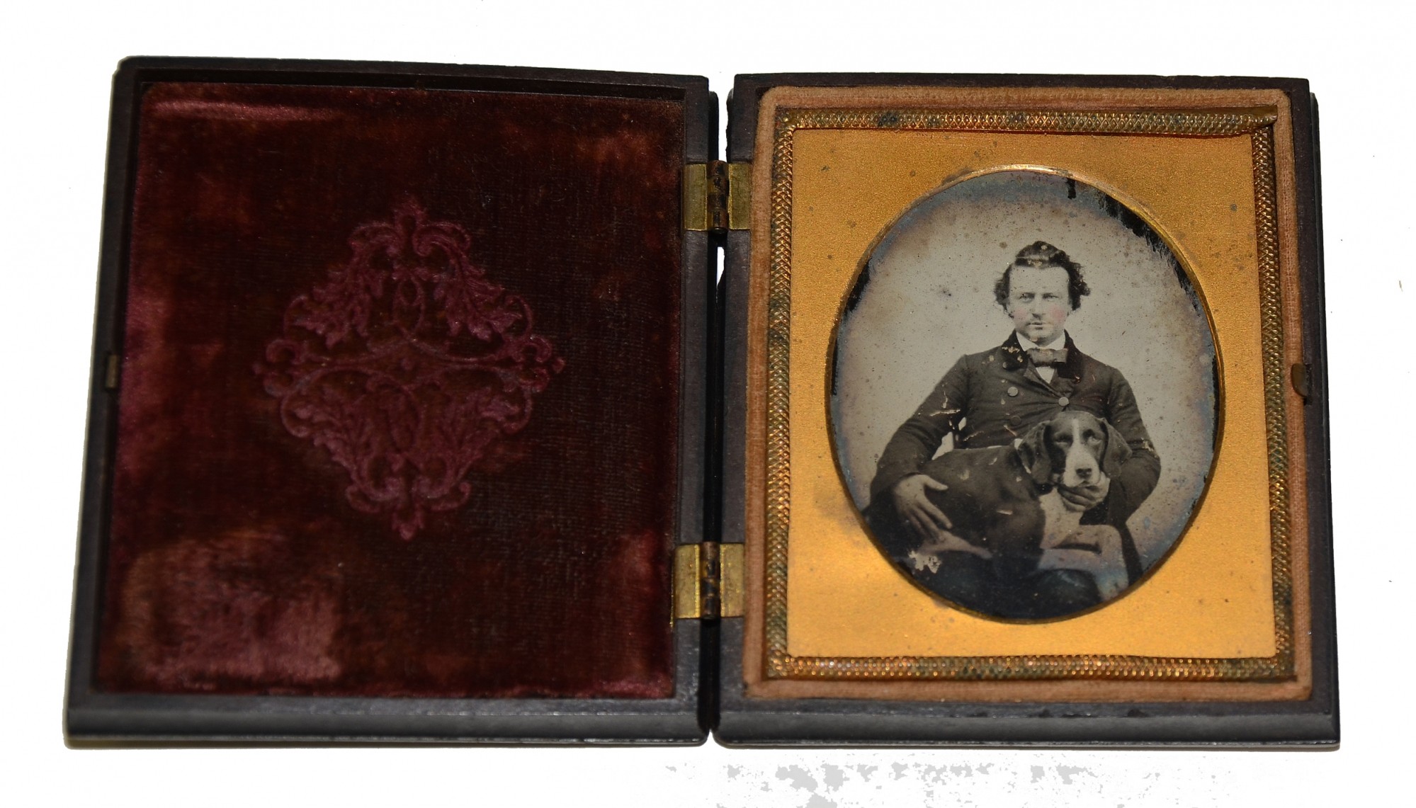 SIXTH PLATE AMBROTYPE OF MAN WITH DOG