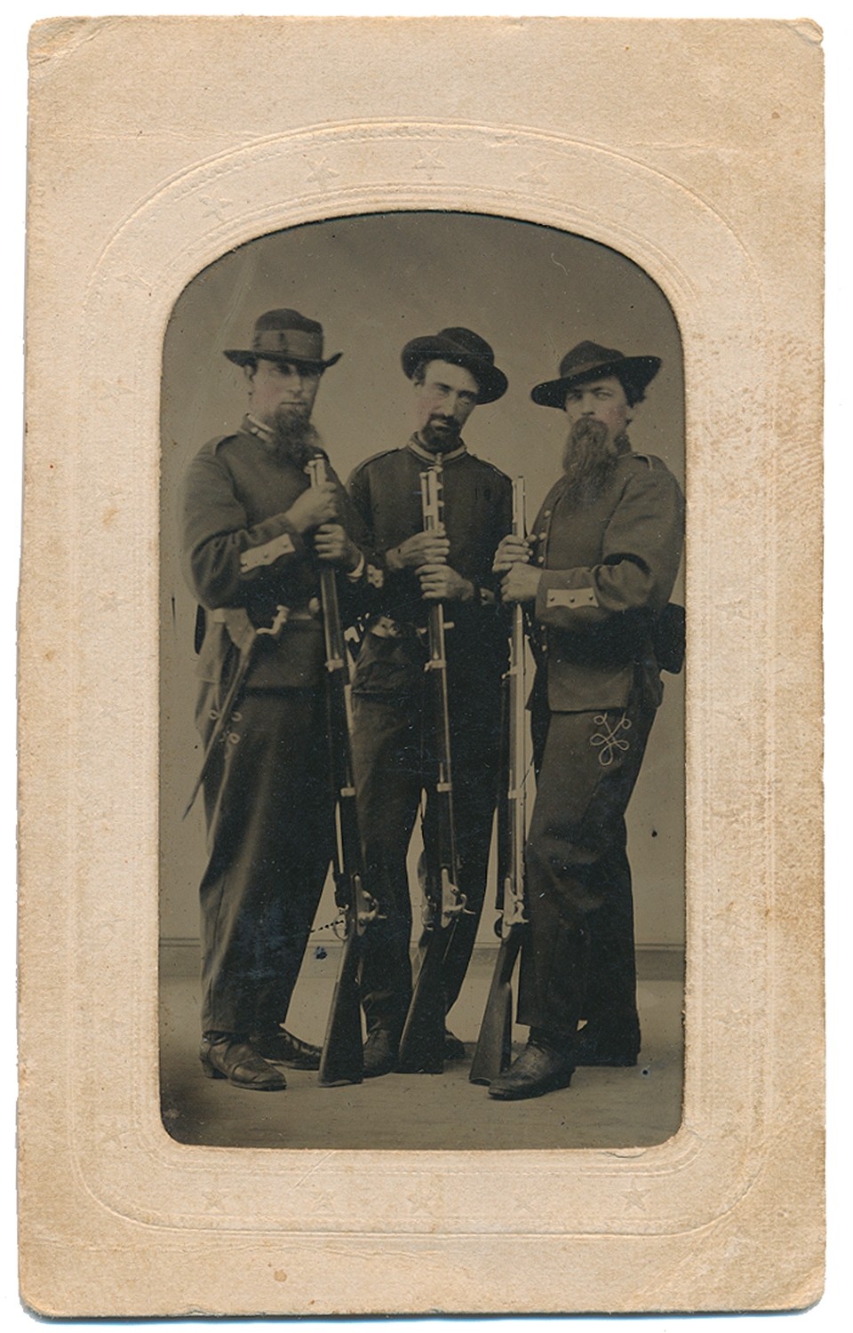 TINTYPE IN CDV MOUNT FEATURING THREE FULL LENGTH STANDING ARMED OFFICERS