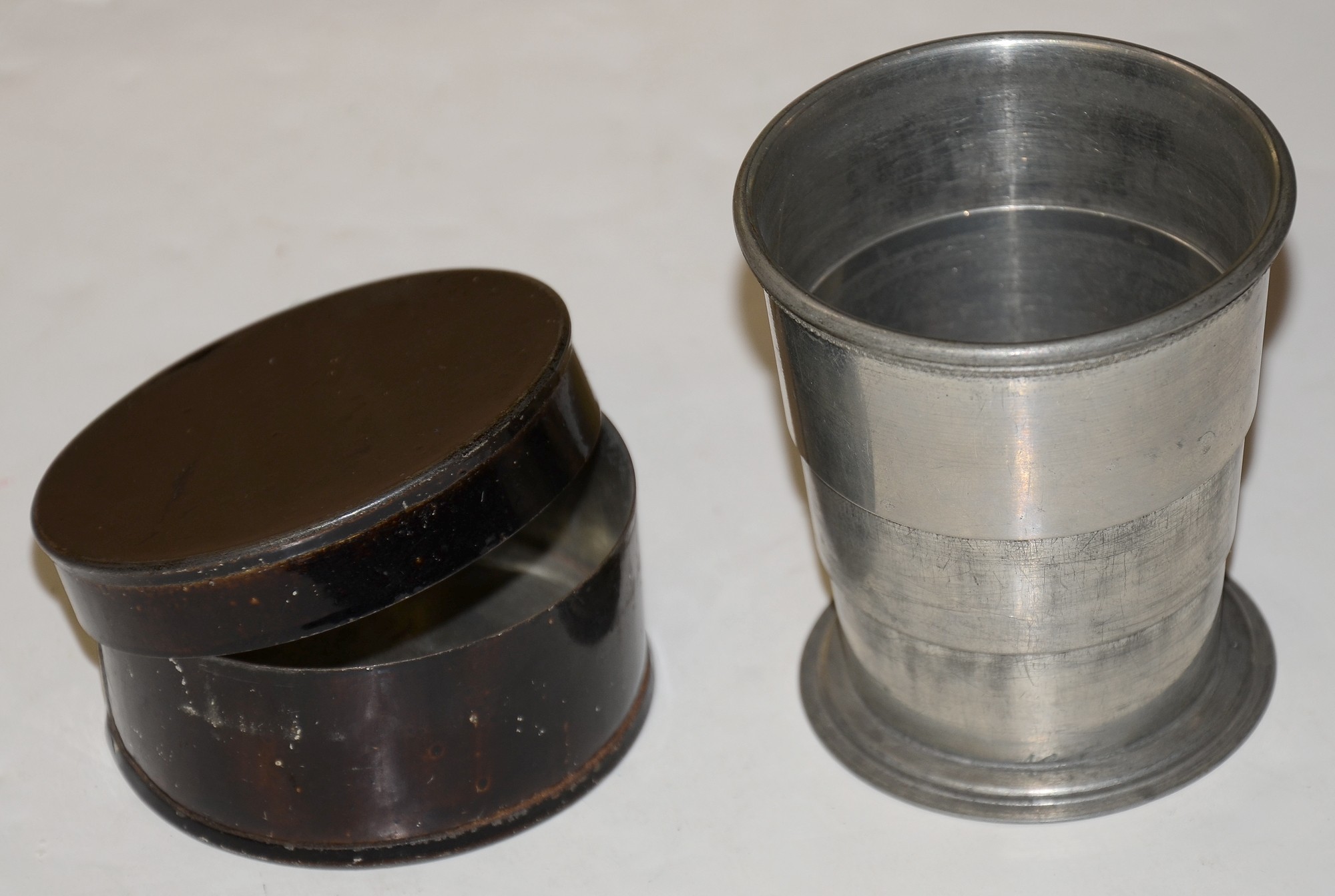 PEWTER COLLAPSIBLE CUP, IN JAPPANED TIN CASE, ca. 1850s-60s