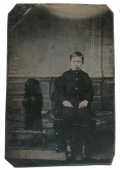 TINTYPE OF BOY WITH DOG STANDING ON ITS HIND LEGS