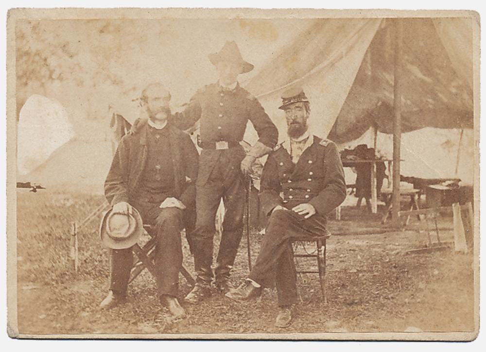 OVERSIZED OUTDOOR VIEW OF TWO OFFICERS & A VISITOR