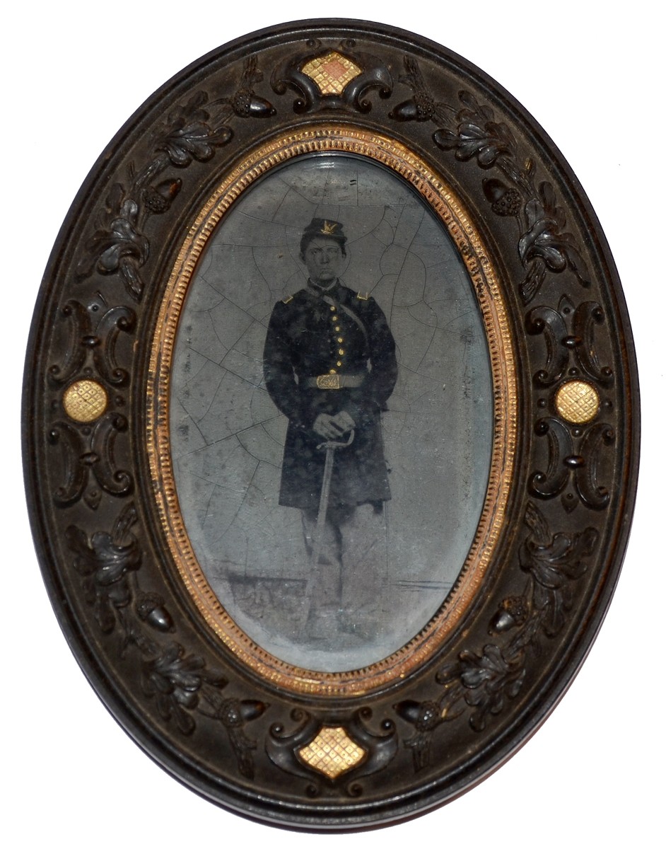 TINTYPE OF AN ARMED UNION 2ND LIEUTENANT IN A THERMOPLASTIC FRAME