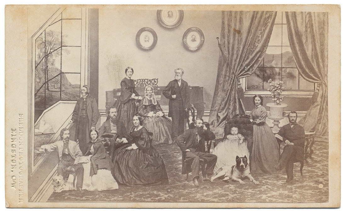 CDV OF A LARGE FAMILY AND THEIR DOGS