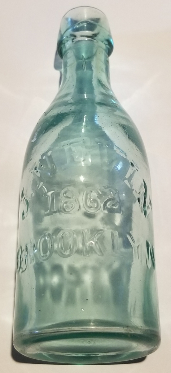J. NEVLIN SODA WATER BOTTLE -1862