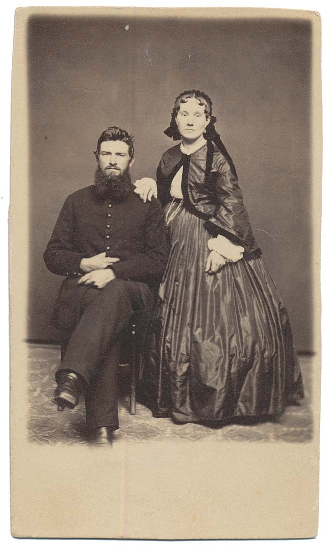 FULL IMAGE OF SEATED SOLDIER AND WIFE