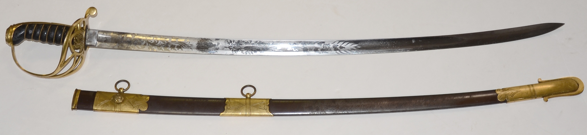 UNIQUE GEORGIA STATE SEAL SWORD BY AMES BELONGING TO LT. WILLIAM FEAY SHELLMAN, OGLETHORP LIGHT INFANTRY, & ADJUTANT 8th GEORGIA, WOUNDED IN ACTION AT MANASSAS, GETTYSBURG, AND COLD HARBOR