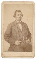 THREE-QUARTER SEATED VIEW OF IOWA INDIAN CHIEF JOHN MAH-HEE