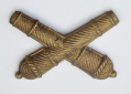 FALSE-EMBROIDERED ARTILLERY OFFICER’S INSIGNIA