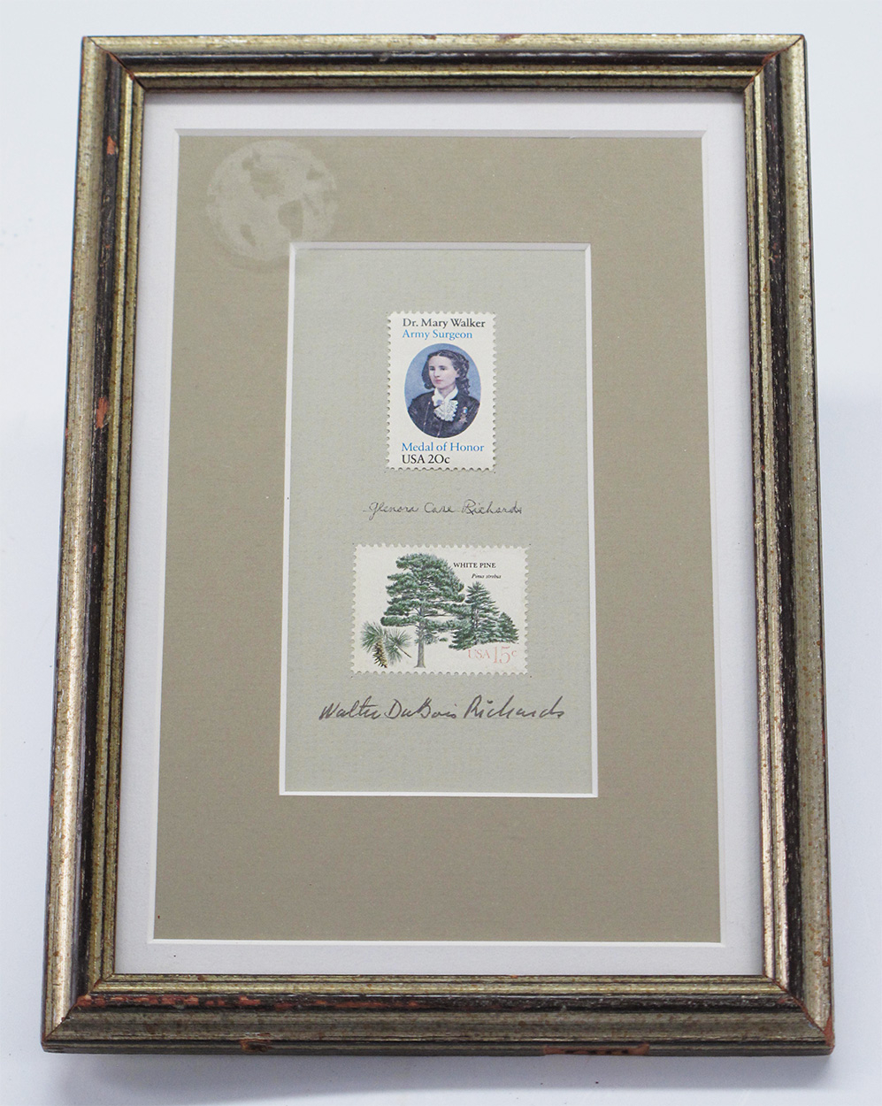 FRAMED SET OF HISTORICAL STAMPS WITH ARTIST'S SIGNATURE