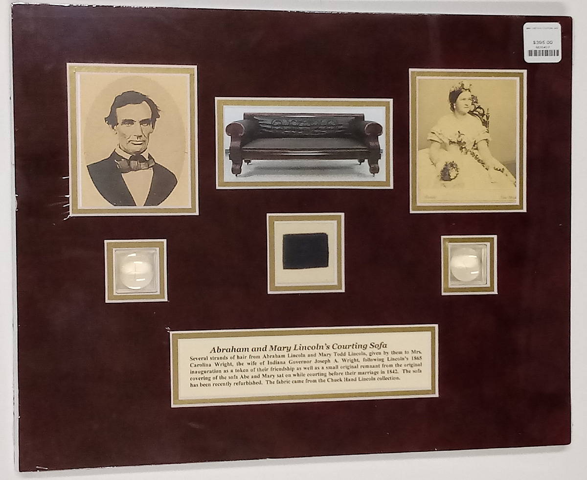 STRANDS OF HAIR FROM ABRAHAM LINCOLN AND MARY LINCOLN, ALONG WITH A FRAGMENT OF CLOTH FROM THEIR COURTING SOFA