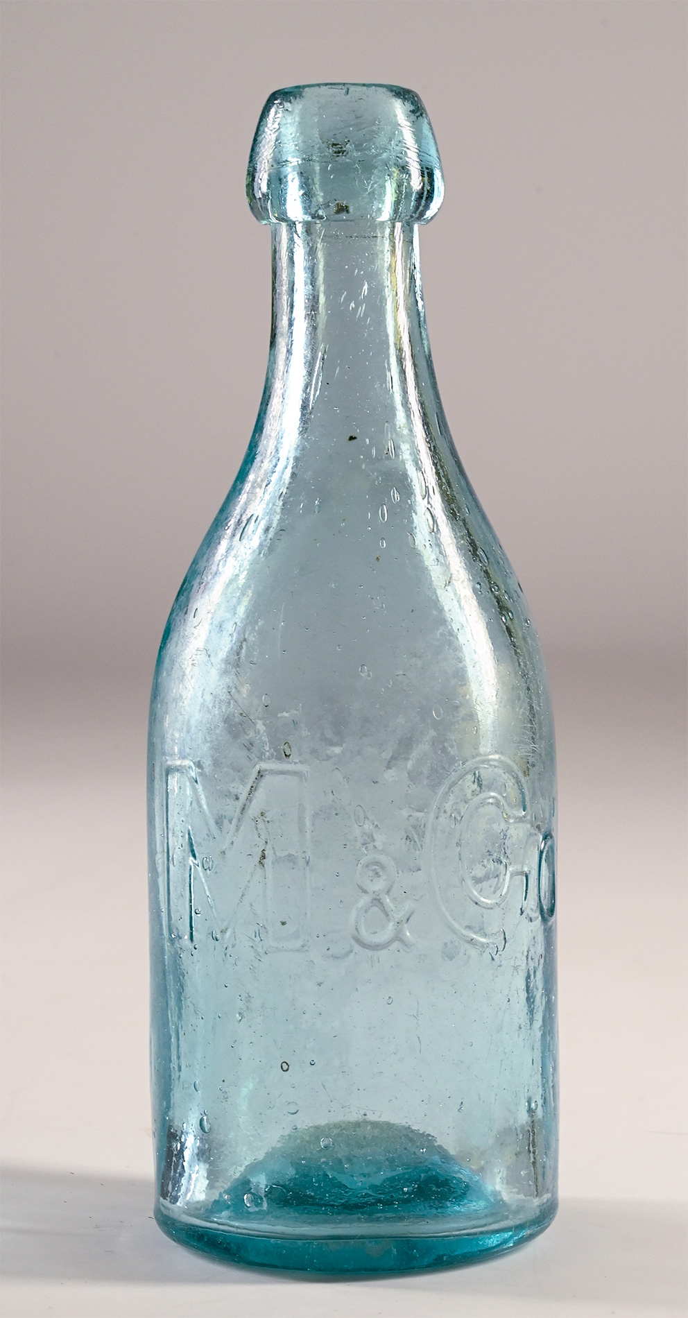 F. MILLER SODA BOTTLE