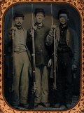 QUARTERPLATE AMBROTYPE OF THREE NEW SOLDIERS WITH MUSKETS