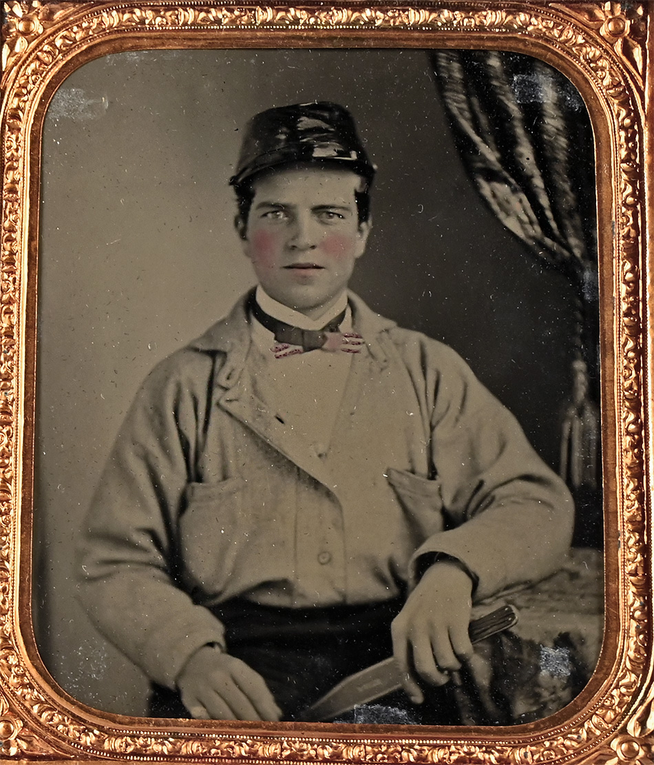 CONFEDERATE RECRUIT WITH BATTLE SHIRT, BOWIE, AND PATRIOTIC NECKTIE
