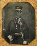 1840s ARMED MILITIA MAN WITH COCKADE AND “JG” HAT INSIGNIA