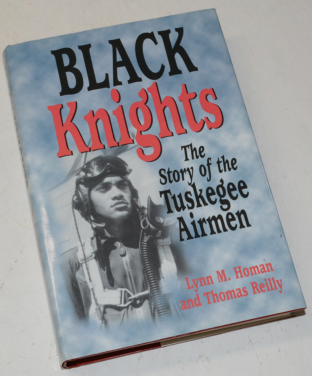TUSKEGEE AIRMEN BOOK SIGNED BY SEVERAL VETERANS