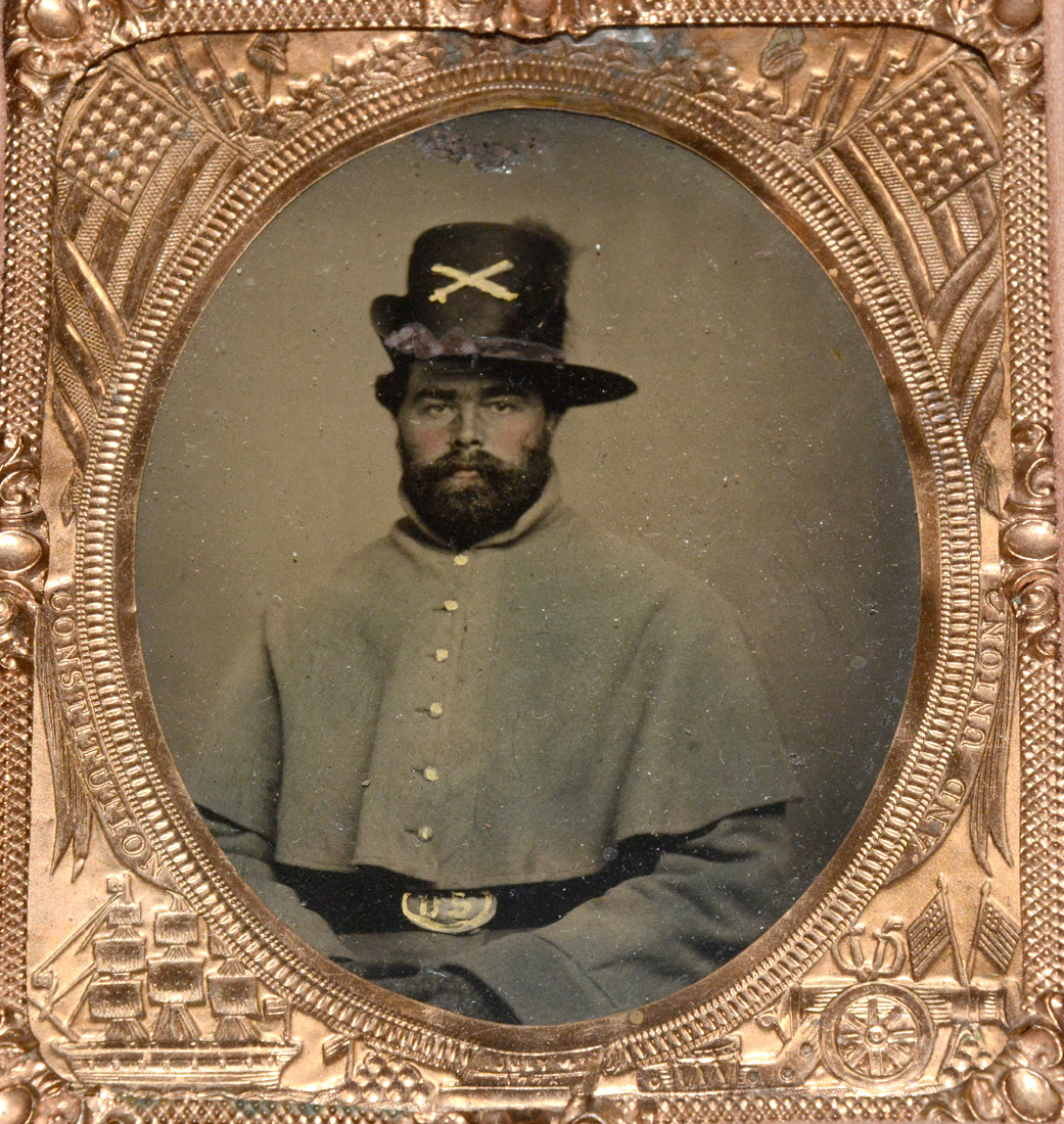 TINTED SEATED VIEW OF A BEARDED UNION SOLDIER
