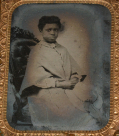 NINTH-PLATE TINTYPE OF A YOUNG BLACK GIRL