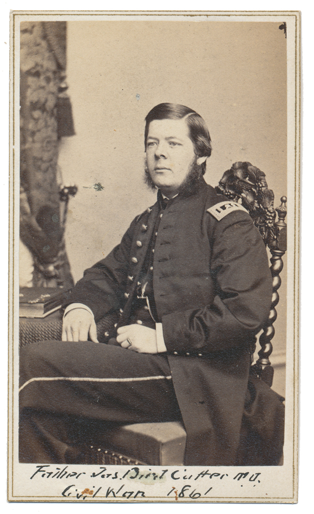THREE-QUARTER SEATED VIEW OF NEW YORK SURGEON