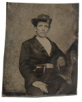 SIXTH-PLATE TINTYPE OF A SEATED MILITIA SOLDIER