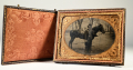 WONDERFUL OUTDOOR QUARTER-PLATE TINTYPE OF UNION OFFICER AND HIS MOUNT IN CAMP