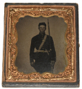 THREE-QUARTER STANDING VIEW OF A DOUBLE ARMED UNION INFANTRYMAN