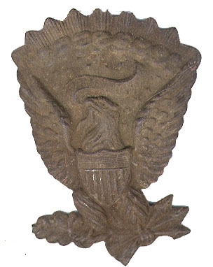 EXCAVATED BRASS 'JEFF DAVIS' STYLE HAT INSIGNIA