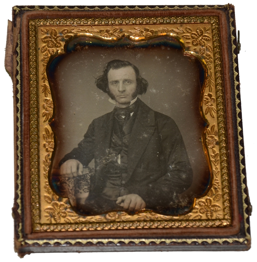 SIXTH PLATE DAGUERREOTYPE OF MAN SITTING WITH TABLE