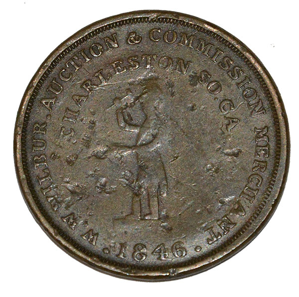 SCARCE CHARLESTON 1846 AUCTION AND COMMISSION MERCHANT TRADE TOKEN: REAL ESTATE, DRY GOODS, STOCKS, BONDS, PROPERTY OF EVERY DESCRIPTION, INCLUDING HUMAN BEINGS