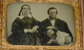 QUARTER PLATE AMBROTYPE OF MAN AND WOMAN WITH DOG