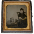 SIXTH PLATE TINTYPE OF YOUNG BOY WITH DOG