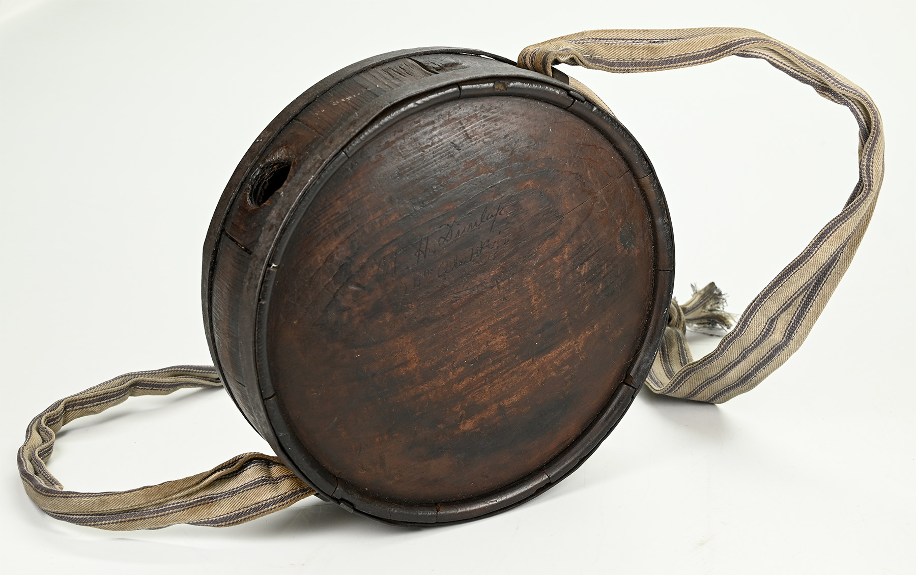 INSCRIBED CONFEDERATE CANTEEN OF LIEUTENANT WILLIAM DUNLAP, CO. C 24th ALABAMA, WOUNDED IN ACTION IN THE BATTLE OF ATLANTA JULY 22, 1864
