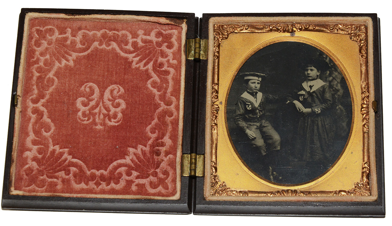 SIXTH-PLATE TINTYPE OF WELL-DRESSED CHILDREN IN NICE “UNION” PHOTOGRAPH CASE