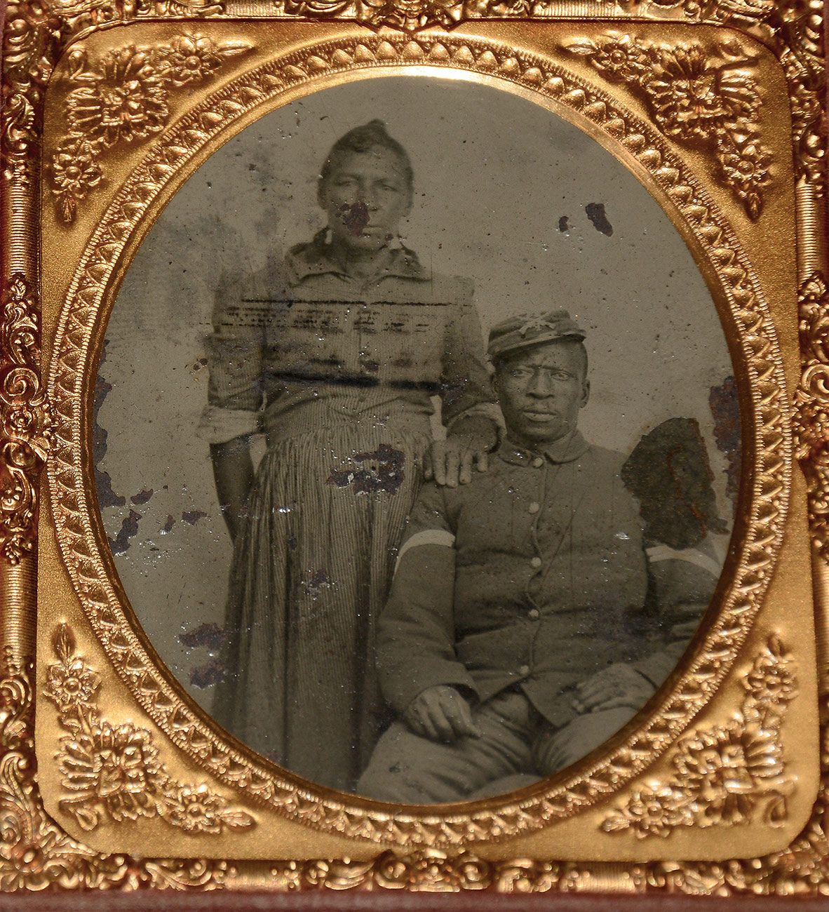 CIRCA 1885 SEATED VIEW OF A BUFFALO SOLDIER OF THE 24TH US INFANTRY AND WIFE