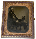 QUARTER PLATE TINTYPE OF W.J. BRADFORD, ADJ. 2nd RHODE ISLAND VOLS., WITH DOG