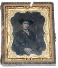 NINTH PLATE TINTYPE OF MAN WITH DOG