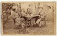 WONDERFUL OUTDOOR CDV OF OFFICERS AND A SERGEANT IN LIGHT COLORED UNIFORMS SEATED AT A TABLE - CONFEDERATE OR UNION MILITIA?