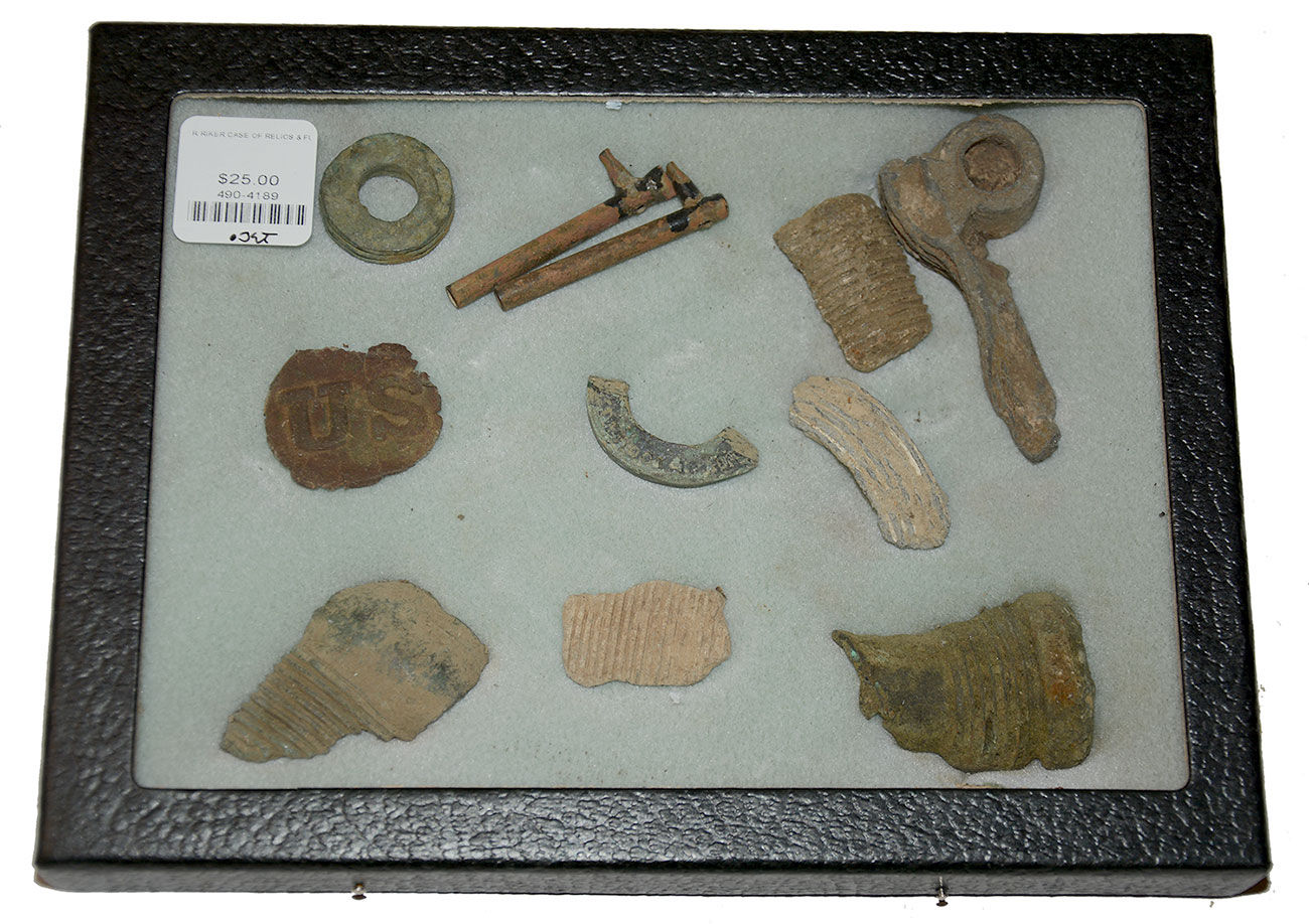 CASE OF RELICS & FUSE PIECES