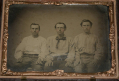 QUARTERPLATE TINTYPE OF THREE MEN IN A MILITARY THEMED UNION CASE