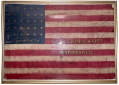 “WE’LL TRY FIGHTING FOR A WHILE.” SCARCE COMPANY FLAG WITH MUNFORDSVILLE BATTLE HONOR: COMPANY K, 74th INDIANA – ONE OF THE REGIMENT’S TWO COMPANIES FIRST TO SEE BATTLE, UNDER JOHN T. WILDER