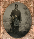 FULL STANDING QUARTER-PLATE TINTYPE OF UNION CAVALRYMAN FROM THE 1st & 20th PENNSYLVANIA CAVALRY