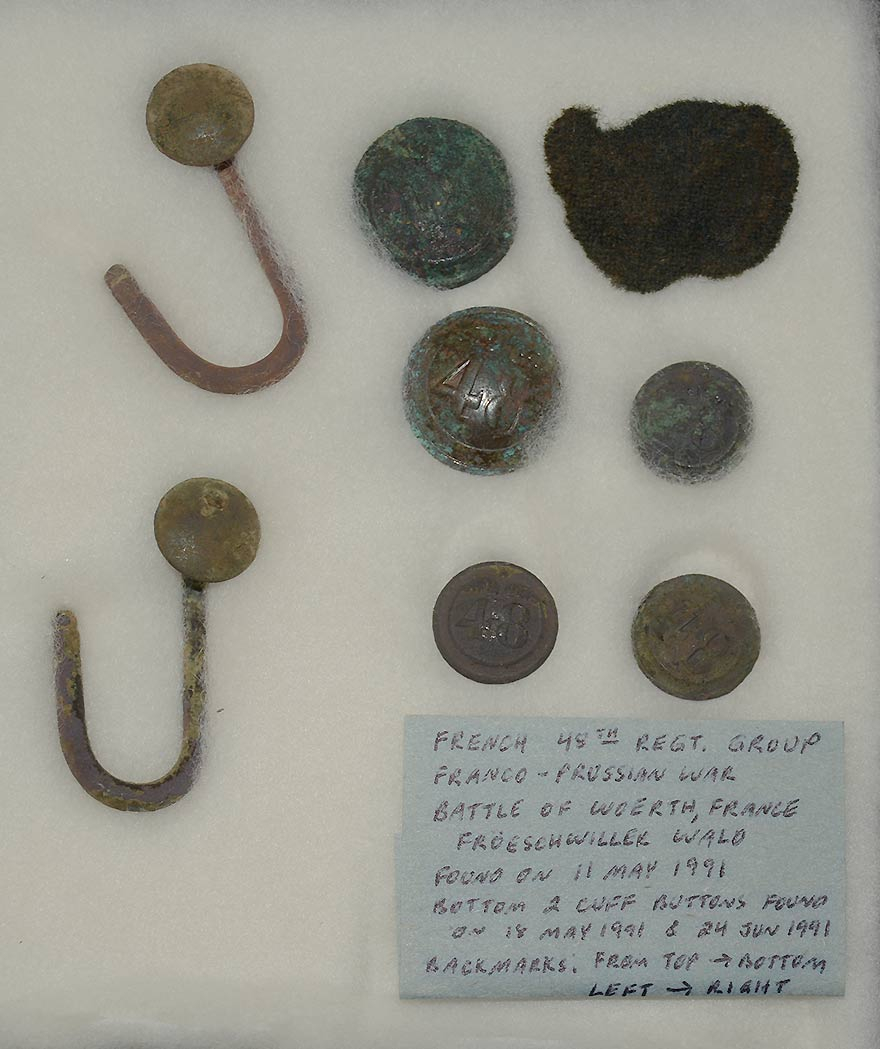SMALL COLLECTION OF RELICS IDENTIFIED TO THE FRENCH 48TH REGIMENT OF INFANTRY FOUND ON THE FRANCO-PRUSSIAN WAR BATTLEFIELD OF WORTH 1870